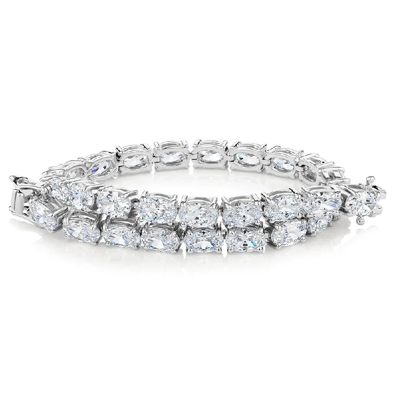 Oval tennis bracelet with 12.04 carats* of diamond simulants in 10 carat white gold