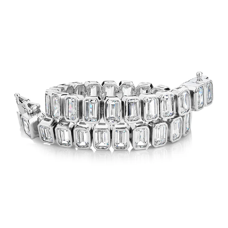 Emerald Cut tennis bracelet with 29.04 carats* of diamond simulants in sterling silver