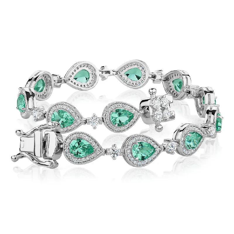 Pear and Round Brilliant tennis bracelet with ocean green simulants and 1.50 carats* of diamond simulants in sterling silver