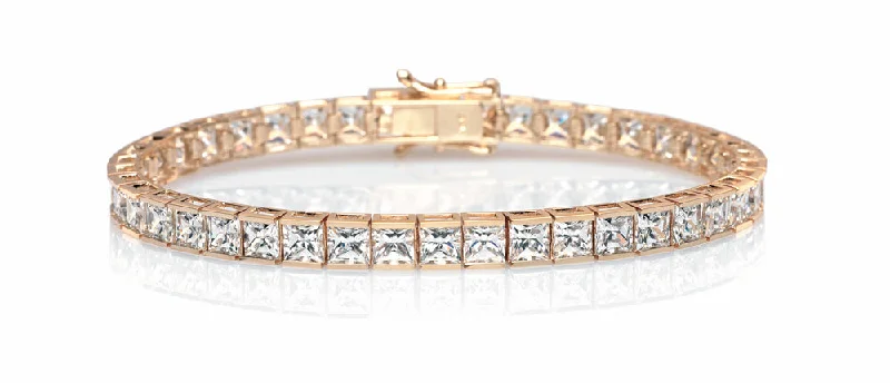 Princess Cut tennis bracelet with 18.72 carats* of diamond simulants in 10 carat yellow gold