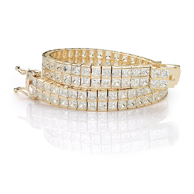 Princess Cut tennis bracelet with 22.68 carats* of diamond simulants in 10 carat yellow gold