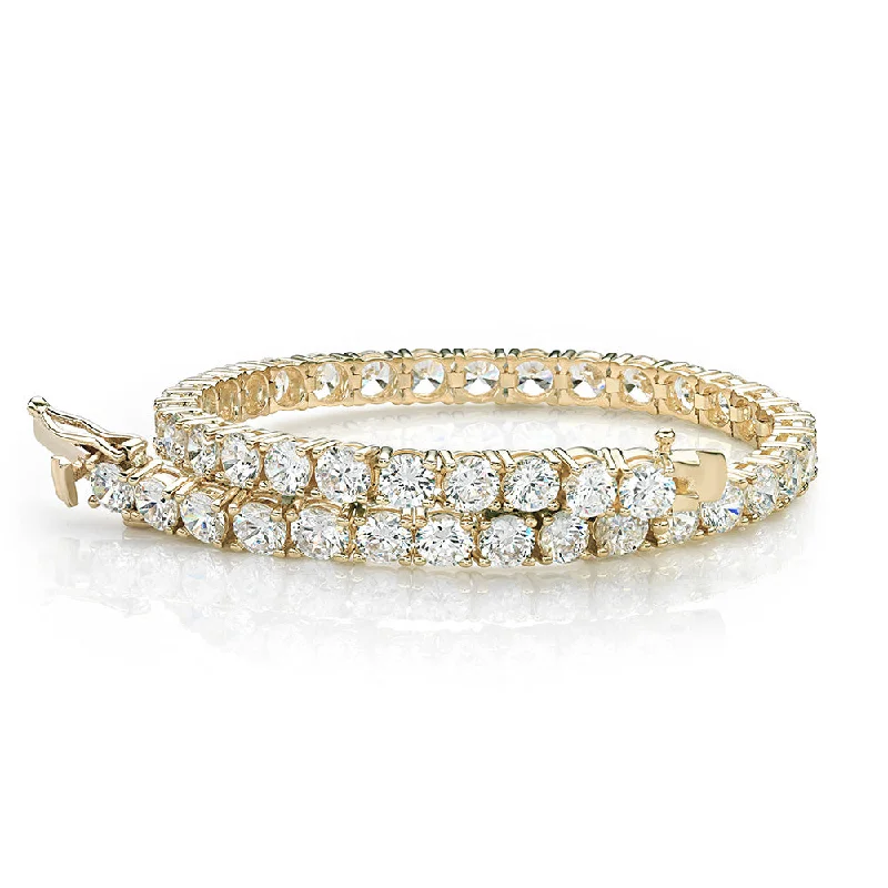 Round Brilliant tennis bracelet with 11 carats* of diamond simulants in 10 carat yellow gold