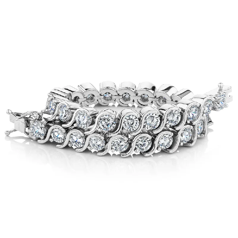 Round Brilliant tennis bracelet with 13.80 carats* of diamond simulants in sterling silver