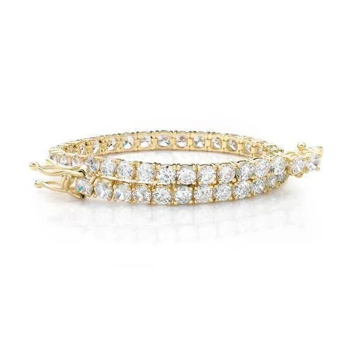 Round Brilliant tennis bracelet with 9.52 carats* of diamond simulants in 10 carat yellow gold